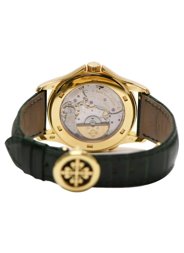 PATEK PHILIPPE - 5131J World Time in Yellow Gold