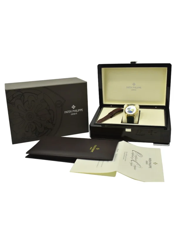 PATEK PHILIPPE - 5131J World Time in Yellow Gold