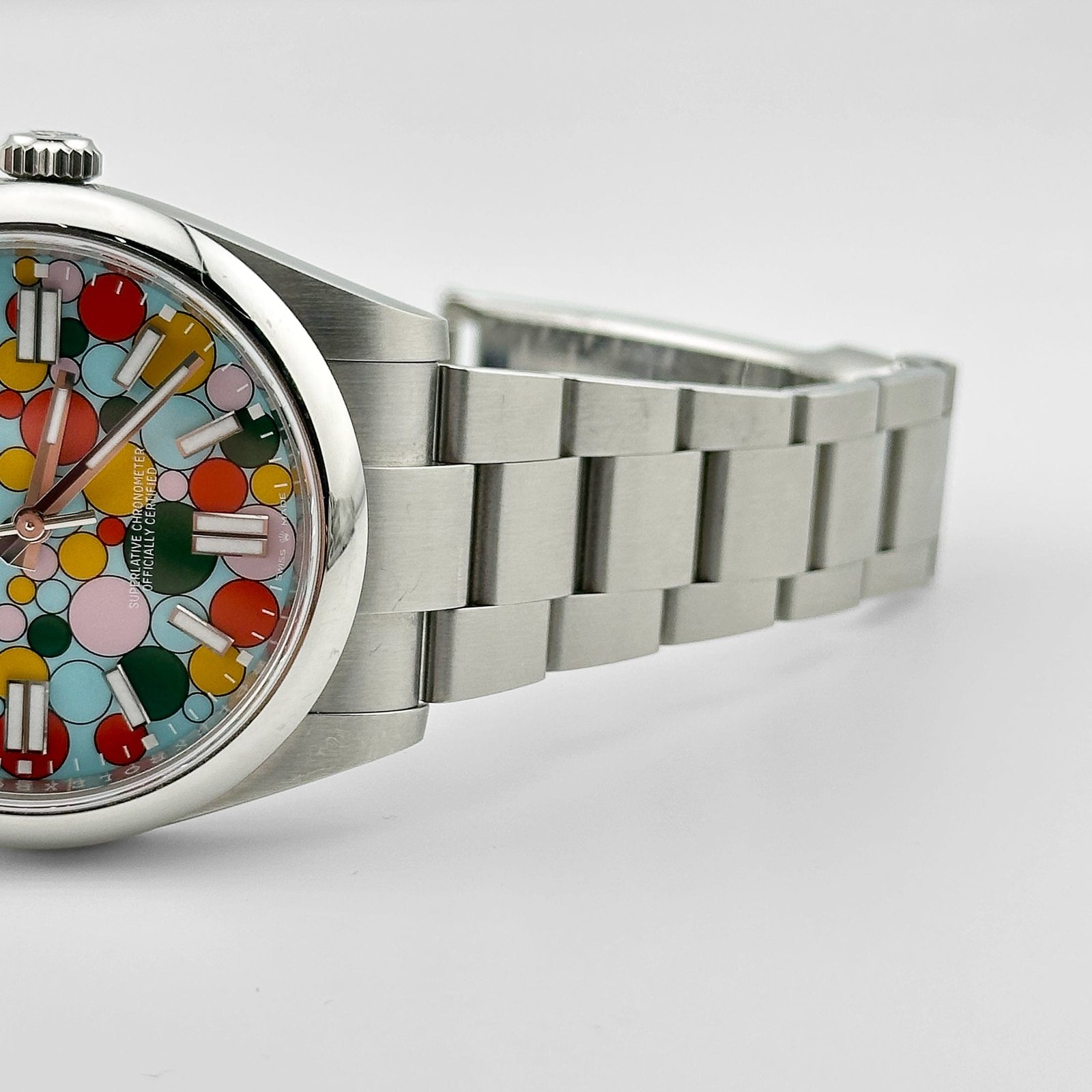 Rolex Oyster Perpetual 41 124300 Stainless Steel 'Celebration Motif' Dial (2024)