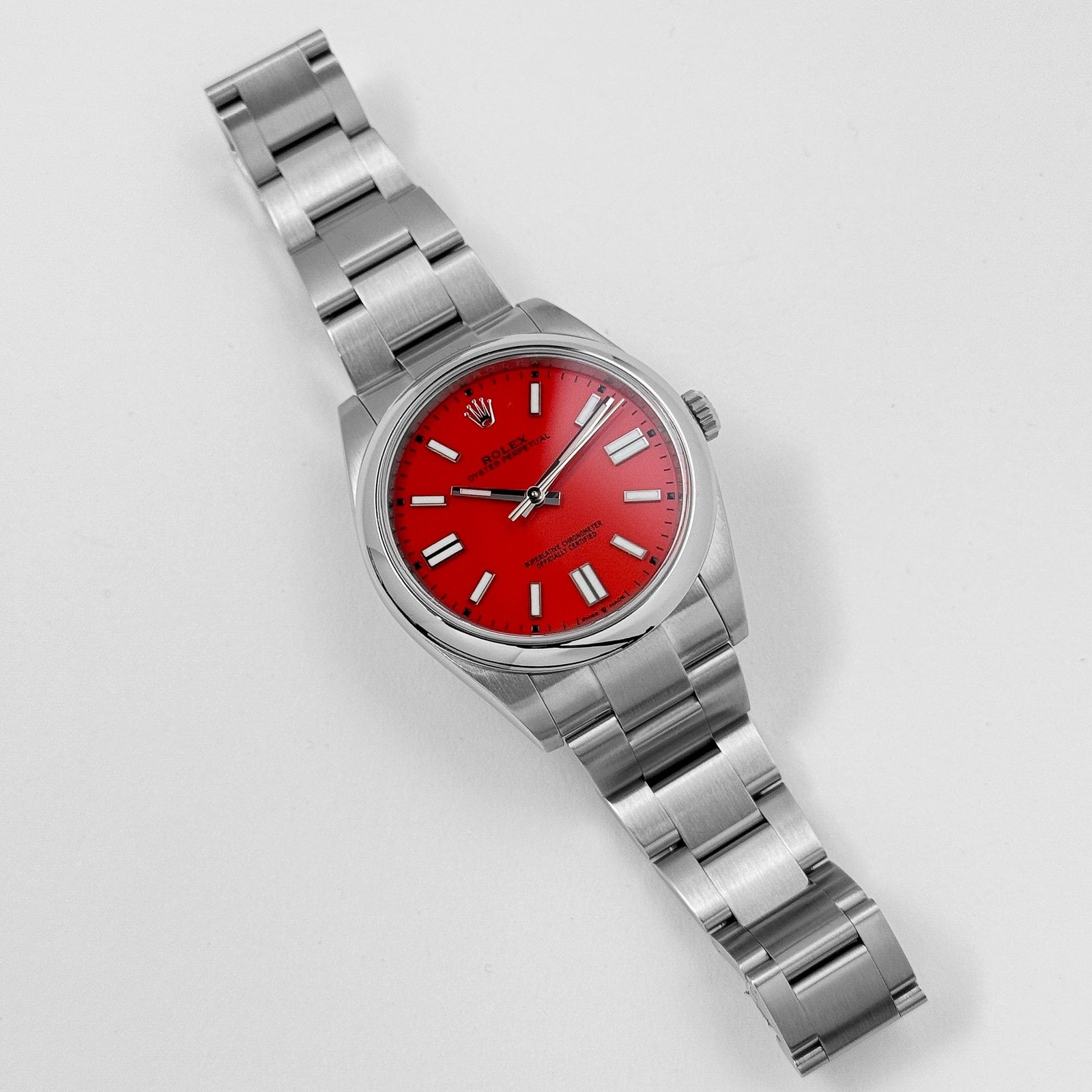 Rolex Oyster Perpetual 41 124300 Stainless Steel Red Dial (2021)